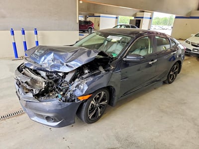 JHMFC1F97JX****** 2018 Honda Civic