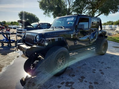 1C4BJWFG9EL****** 2014 Jeep Wrangler