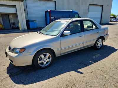 JM1BJ225420****** 2002 Mazda Protege