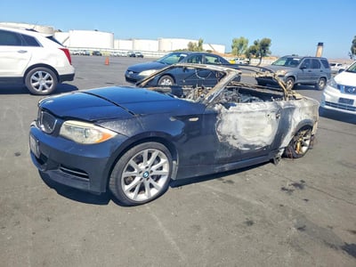 WBAUN7C54CV****** 2012 BMW 1 Series