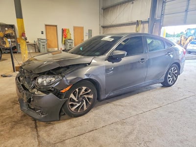 2HGFC2F7XJH****** 2018 Honda Civic