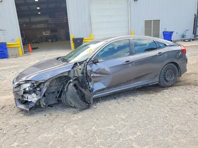 2HGFC2F54JH****** 2018 Honda Civic