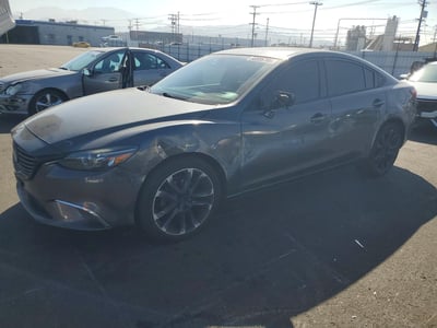 JM1GJ1W53G1****** 2016 Mazda 6