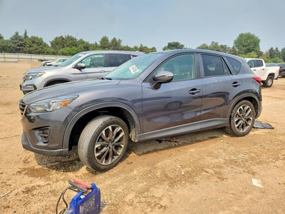 JM3KE4DY7G0****** 2016 Mazda CX-5