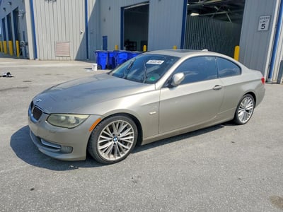 WBAKG7C59BE****** 2011 BMW 3 Series