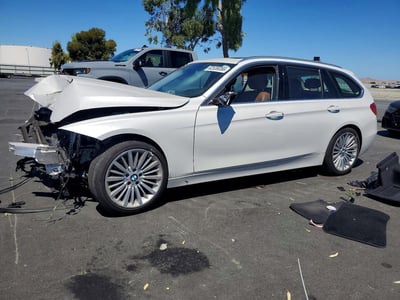 WBA3K5C58EK****** 2014 BMW 3 Series