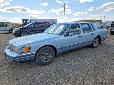 1LNCM82F4LY****** 1990 Lincoln Town Car