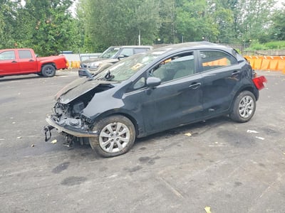 KNADM5A33E6****** 2014 Kia Rio