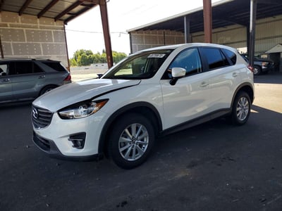 JM3KE4CY8G0****** 2016 Mazda CX-5