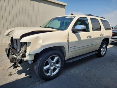 1GNSCCE07ER****** 2014 Chevrolet Tahoe