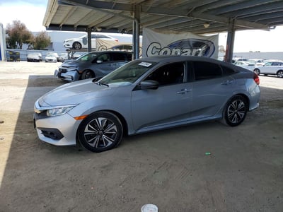 JHMFC1F34JX****** 2018 Honda Civic