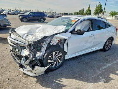 2HGFC2F77JH****** 2018 Honda Civic