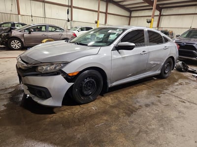 2HGFC2F57JH****** 2018 Honda Civic
