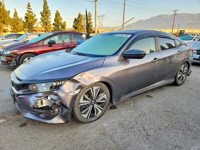 JHMFC1F36JX****** 2018 Honda Civic