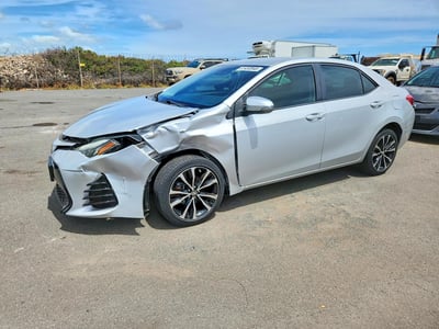 5YFBURHE6JP****** 2018 Toyota Corolla