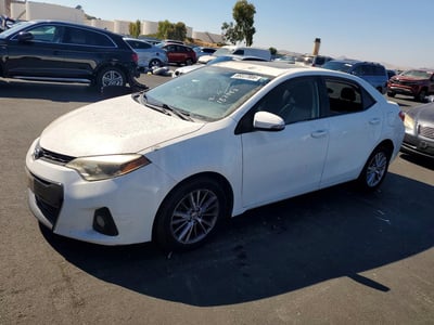 5YFBURHE7EP****** 2014 Toyota Corolla