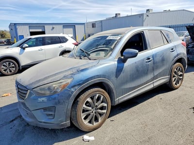 JM3KE4DY7G0****** 2016 Mazda CX-5