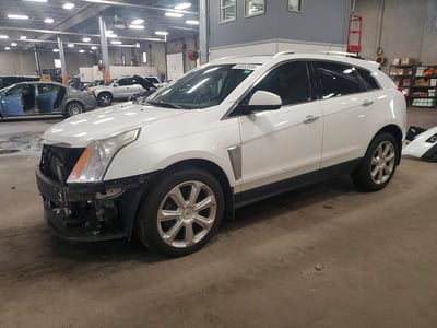3GYFNFE37ES****** 2014 Cadillac SRX