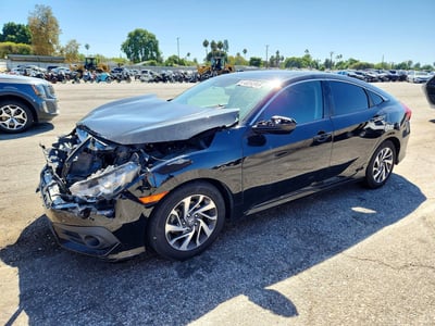 2HGFC2F8XJH****** 2018 Honda Civic