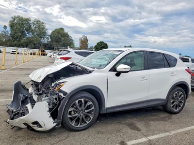 JM3KE2DY0G0****** 2016 Mazda CX-5