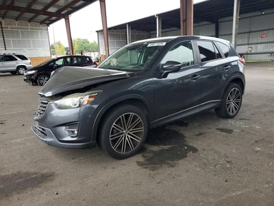 JM3KE4DY7G0****** 2016 Mazda CX-5