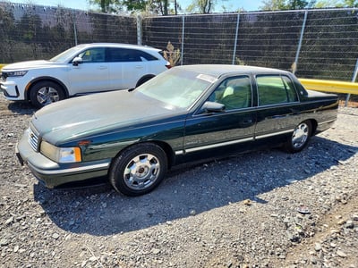 1G6KD54Y7VU****** 1997 Cadillac Deville