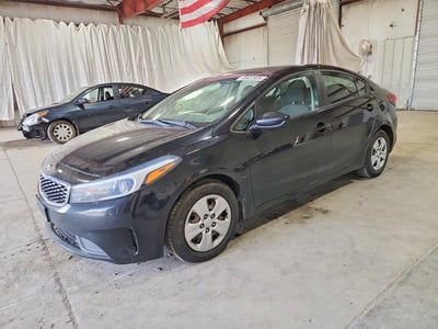 3KPFL4A76JE****** 2018 Kia Forte
