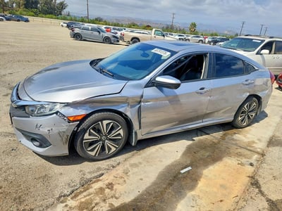 JHMFC1F81JX****** 2018 Honda Civic