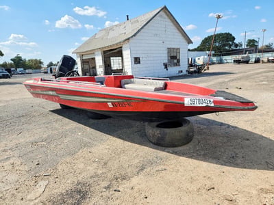 BASK124***** 1989 Bass Cat Boat