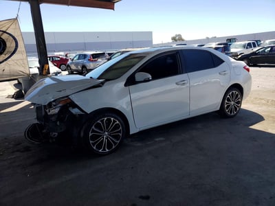 5YFBURHE6EP****** 2014 Toyota Corolla