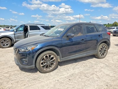 JM3KE2DY9G0****** 2016 Mazda CX-5