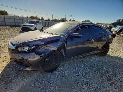 2HGFC2F52JH****** 2018 Honda Civic