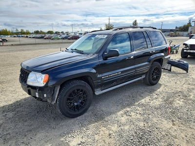 1J8GW68JX3C****** 2003 Jeep Grand Cherokee