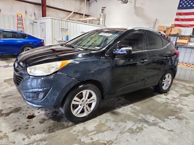 KM8JU3AC4CU****** 2012 Hyundai Tucson