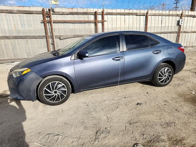 5YFBURHE3EP****** 2014 Toyota Corolla