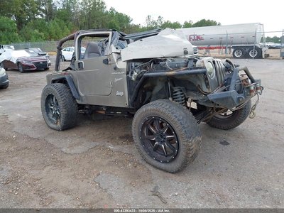 1J4FA49S52P****** 2002 Jeep Wrangler