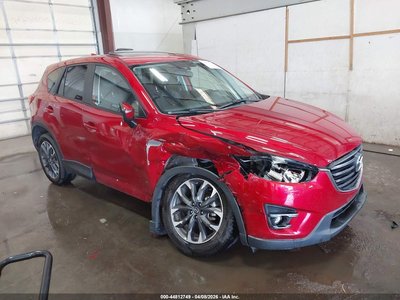 JM3KE2DY0G0****** 2016 Mazda CX-5