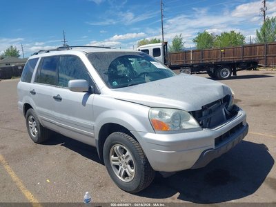 2HKYF18414H****** 2004 Honda Pilot
