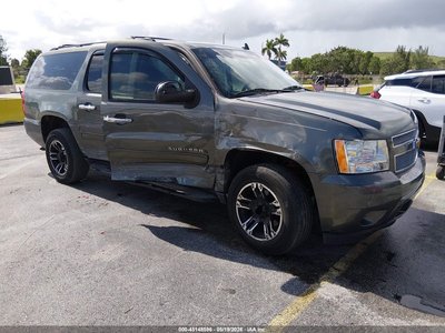 1GNSKHE34BR****** 2011 Chevrolet Suburban 1500