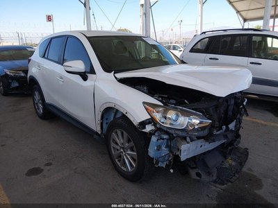 JM3KE4BY1G0****** 2016 Mazda CX-5