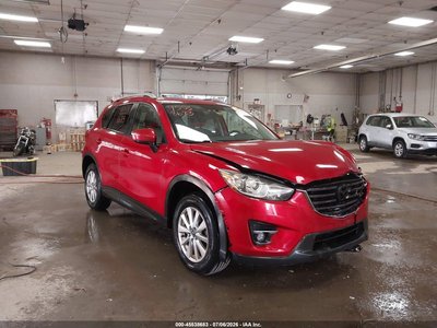 JM3KE4CY7G0****** 2016 Mazda CX-5