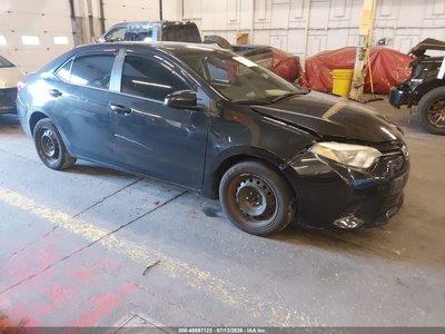 5YFBURHE7EP****** 2014 Toyota Corolla