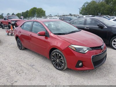 5YFBURHE7EP****** 2014 Toyota Corolla