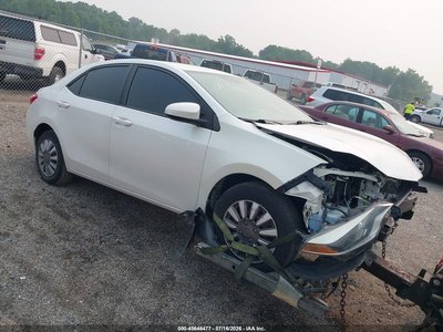 5YFBPRHEXEP****** 2014 Toyota Corolla