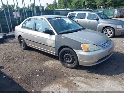 1HGES16672L****** 2002 Honda Civic