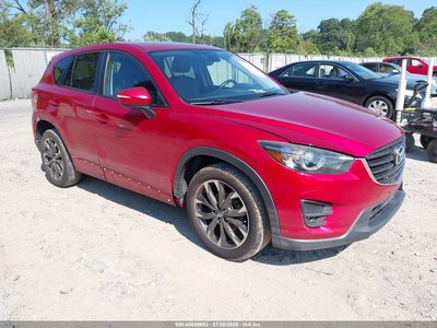 JM3KE4DY6G0****** 2016 Mazda CX-5
