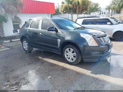 3GYFNBE35ES****** 2014 Cadillac SRX