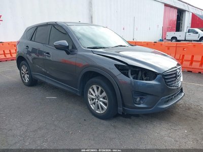 JM3KE4CY6G0****** 2016 Mazda CX-5