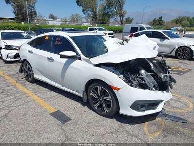JHMFC1F94JX****** 2018 Honda Civic