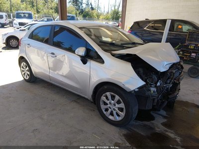 KNADM5A35E6****** 2014 Kia Rio